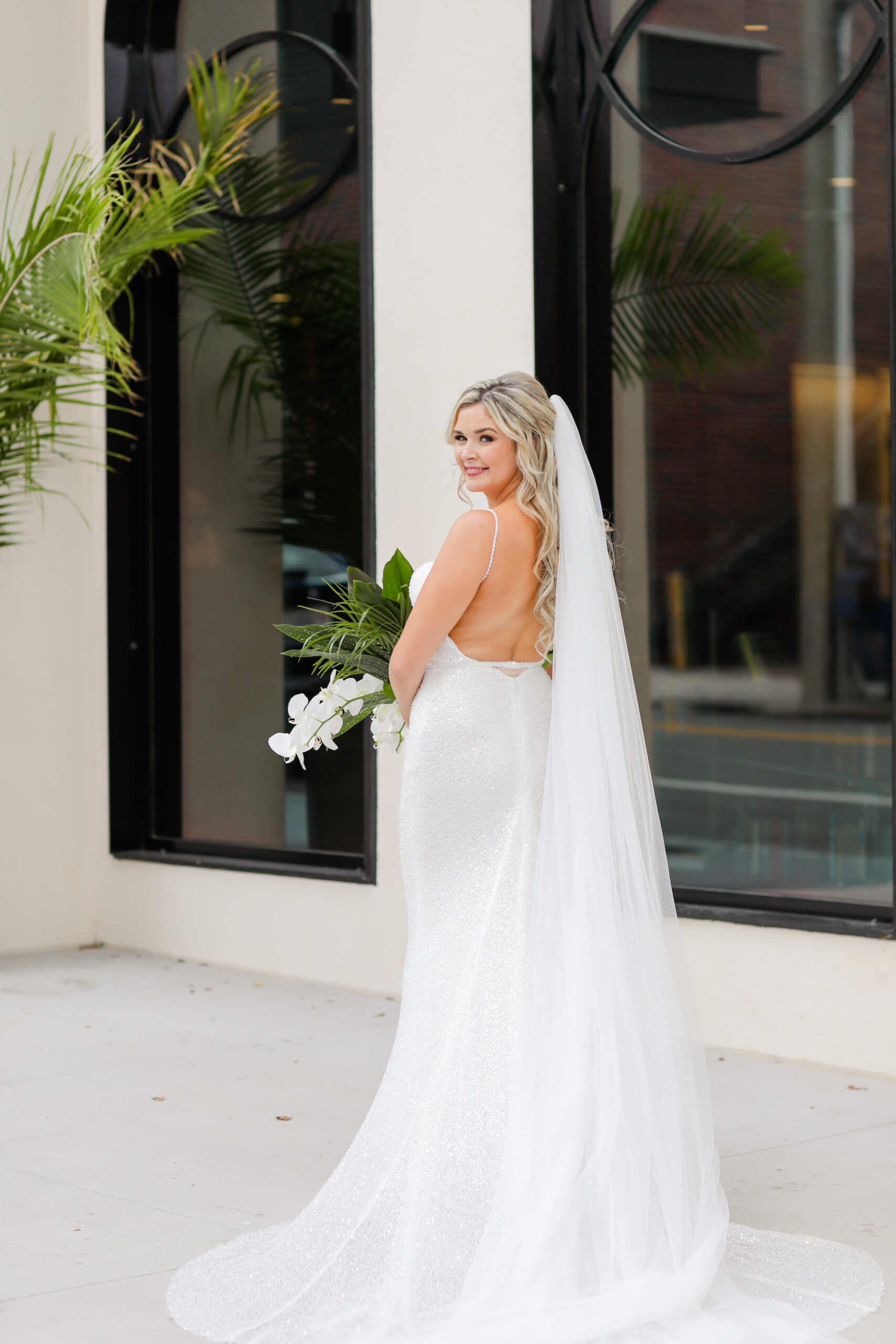 Bride in Backless Fitted Wedding Dress with Cathedral Veil | Tampa Hair and Makeup Artist Femme Akoi | Lifelong Photography Studio