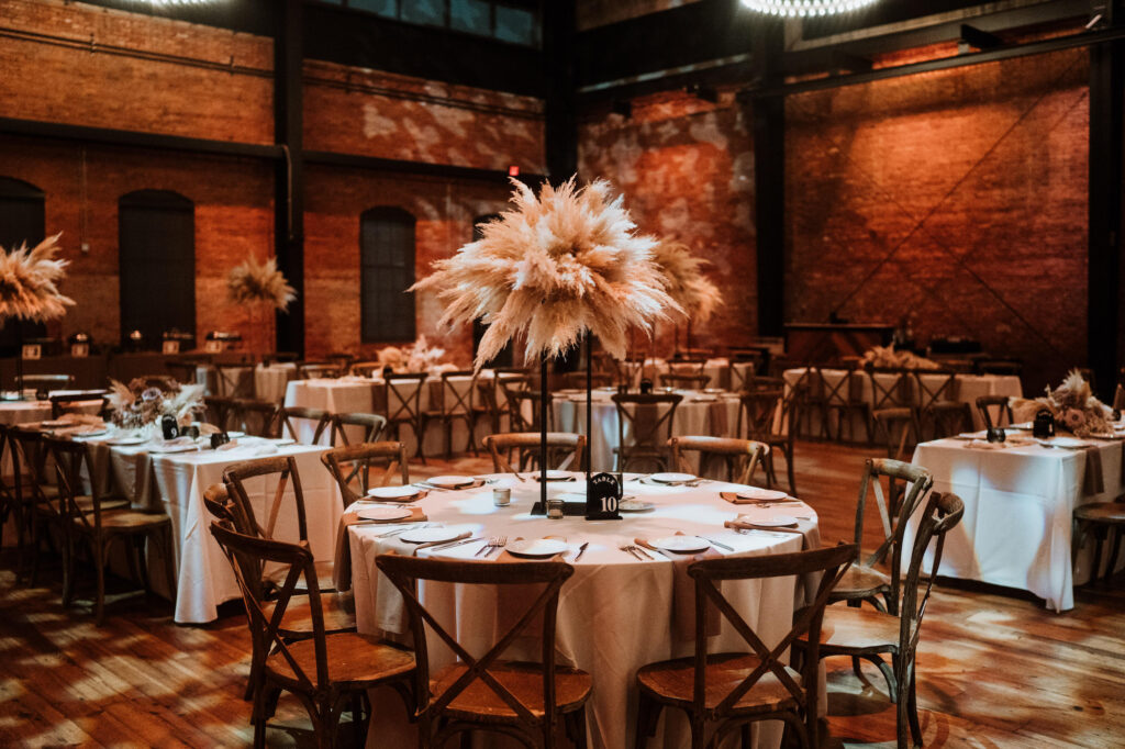 Modern Boho Tall Pampas Centerpiece on Black Stand for Dark and Moody Tablescape Wedding Reception Inspiration | Tampa Venue Amature Works