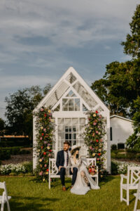 Modern White Greenhouse Outdoor Garden Wedding Ceremony with Tall Ceremony Altar Floral Arrangements | Tampa Bay Venue Cross Creek Ranch | Florist Monarch Events and Design