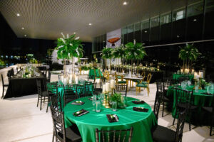 Modern Glam Emerald Green and Black Wedding Inspiration | Chiavari Chairs | Gold Louis Pop Chairs with Velvet Seat Covers | Long Feasting Tables | Tampa Bay Rentals A Chair Affair