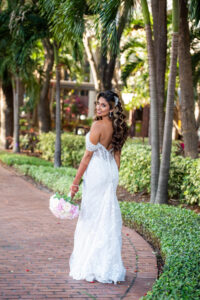 Modern Bride Wearing Fitted Wedding Dress, Henna, Blush Pink and Ivory Floral Bouquet, Hollywood Curls | Florida Wedding Venue Hilton Downtown Tampa | Tampa Bay Hair and Makeup Artist Michele Renee the Studio