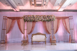 Modern Luxurious Ballroom Wedding Reception, White Floor, Pink Draping, Sweetheart Satee Under Floral Mandap | Florida Wedding Venue Hilton Downtown Tampa