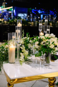 Candlelit Wedding Reception Centerpiece Ideas with Greenery and White Flowers