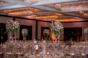 Romantic Ballroom Wedding Reception, Long Feasting Table with Sequined Rose Gold Linens, Chiavari Chairs, Tall Pink and White Floral Centerpieces | Florida Wedding Venue Hilton Downtown tampa