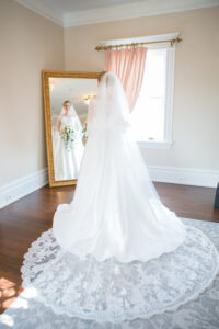 Ivory Spaghetti Strap A-Line Wedding Dress Inspiration | Chapel Length Lace Veil Ideas | Tampa Bay Boutique Truly Forever Bridal
