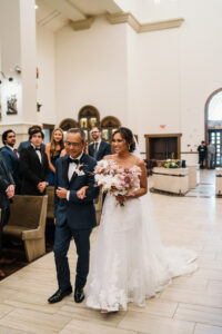 Father of the Bride Walks Bride Down the Aisle in Church Wedding Ceremony Portrait
