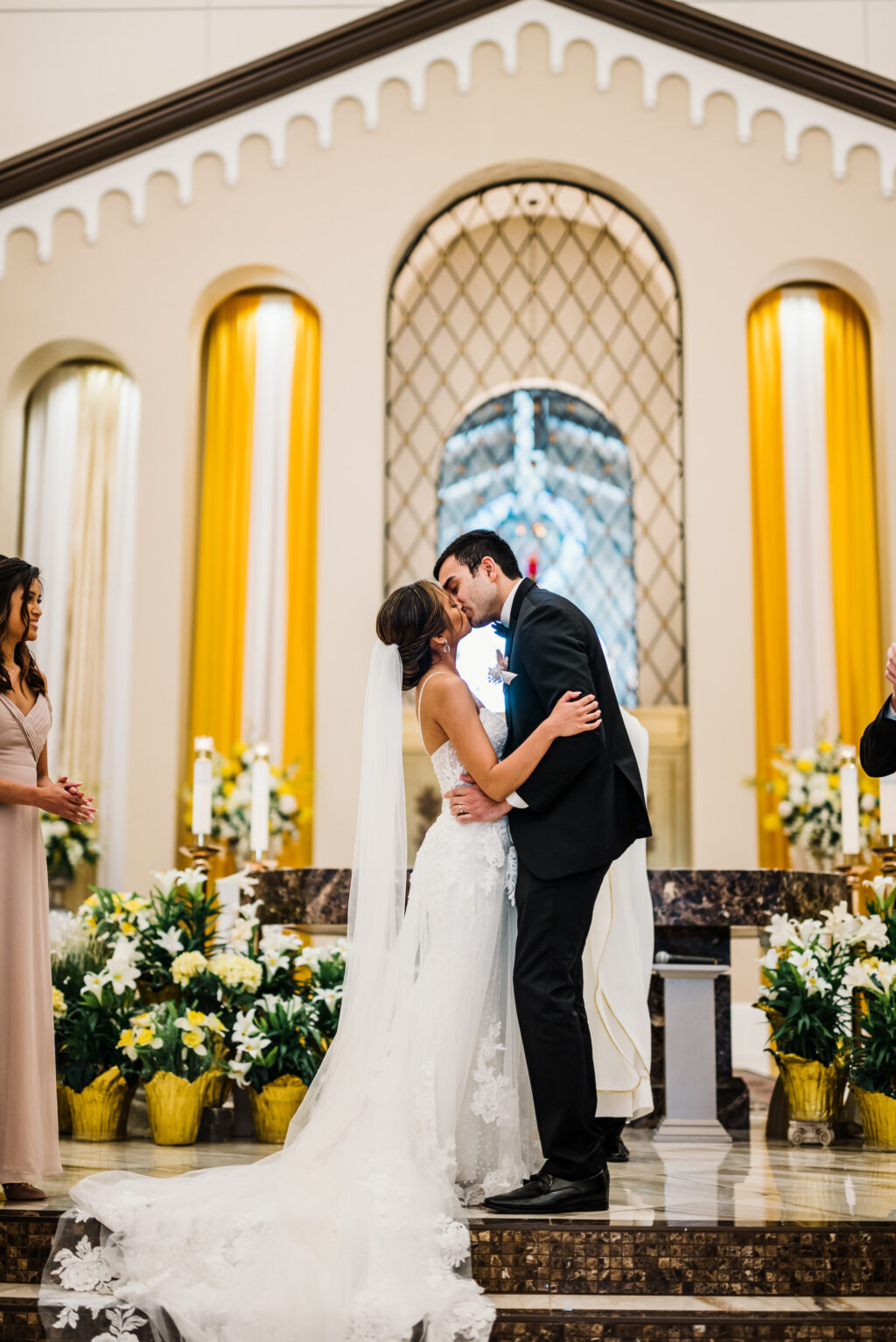 Bride and Groom First Kiss Wedding in Church Ceremony Wedding Portrait