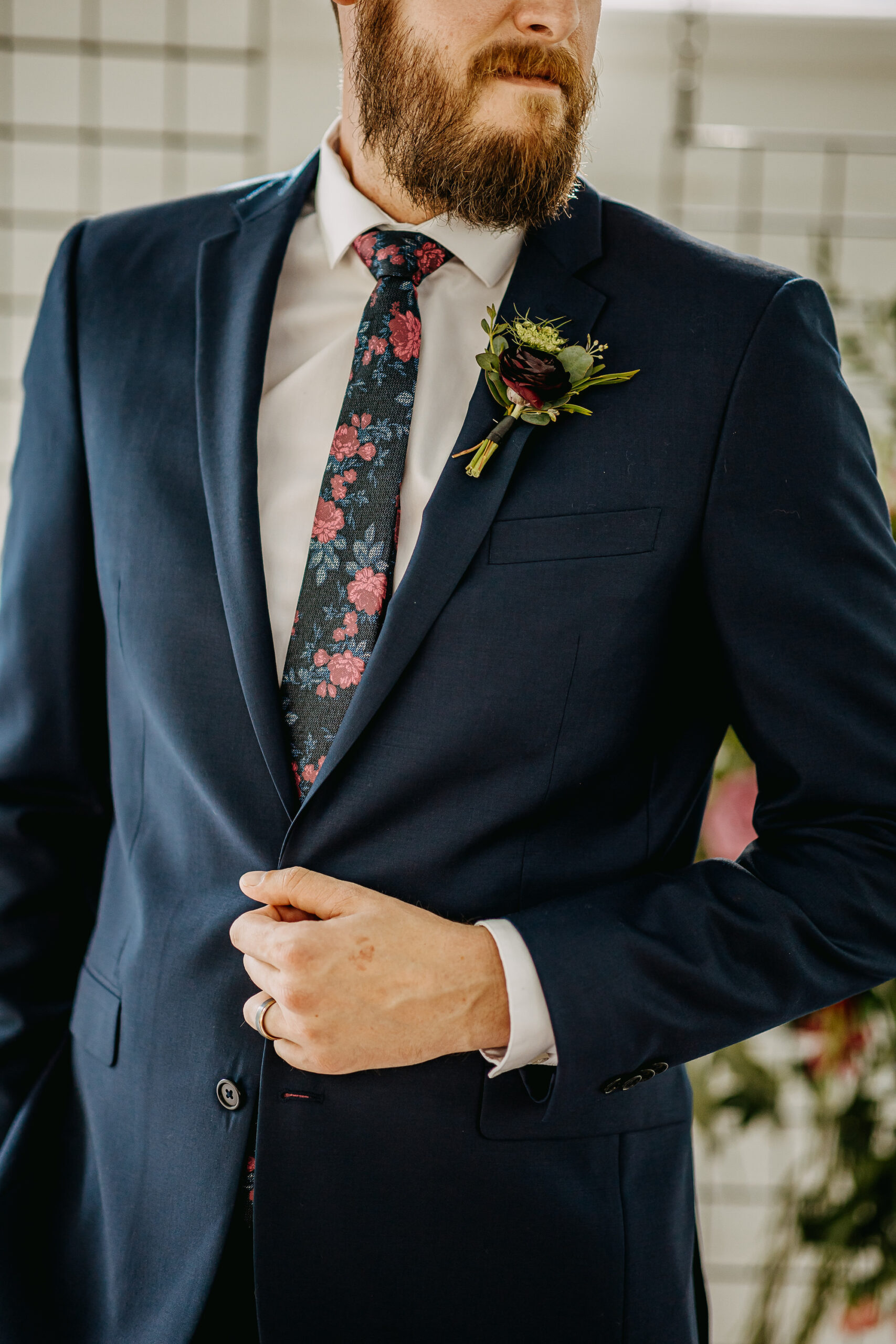 Groom's Floral Tie with Navy Wedding Suit