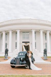 Vintage Old Hollywood Gatsby Inspired Wedding Bride and Groom with Classic Car | Tampa Bay Wedding Venue The Whitehurst Gallery