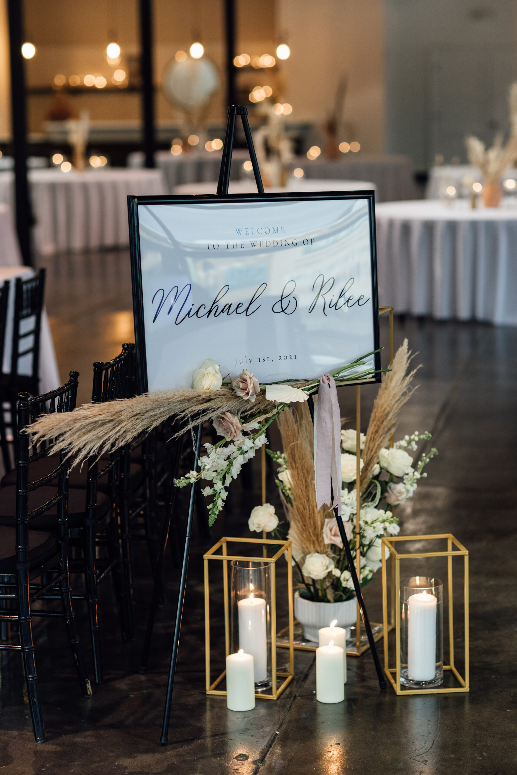 Modern Wedding Ceremony Welcome Frame Sign With Bohemian Floral Arrangements and Gold Candlelit Lanterns