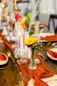 Wedding Reception Disco Ball and Fall Boho Floral Centerpiece Ideas with Terracotta Orange Table Runners