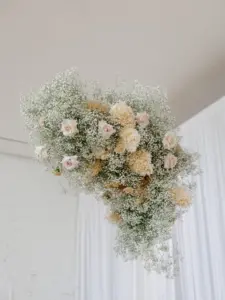 Romantic Vintage Neutral Hanging Floral Chandelier with Baby's Breath, Pink Roses, and Cream Hydrangeas Wedding Ceremony Decor Ideas