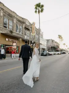 Bride and Groom Walking the Streets of Ybor Wedding Portrait