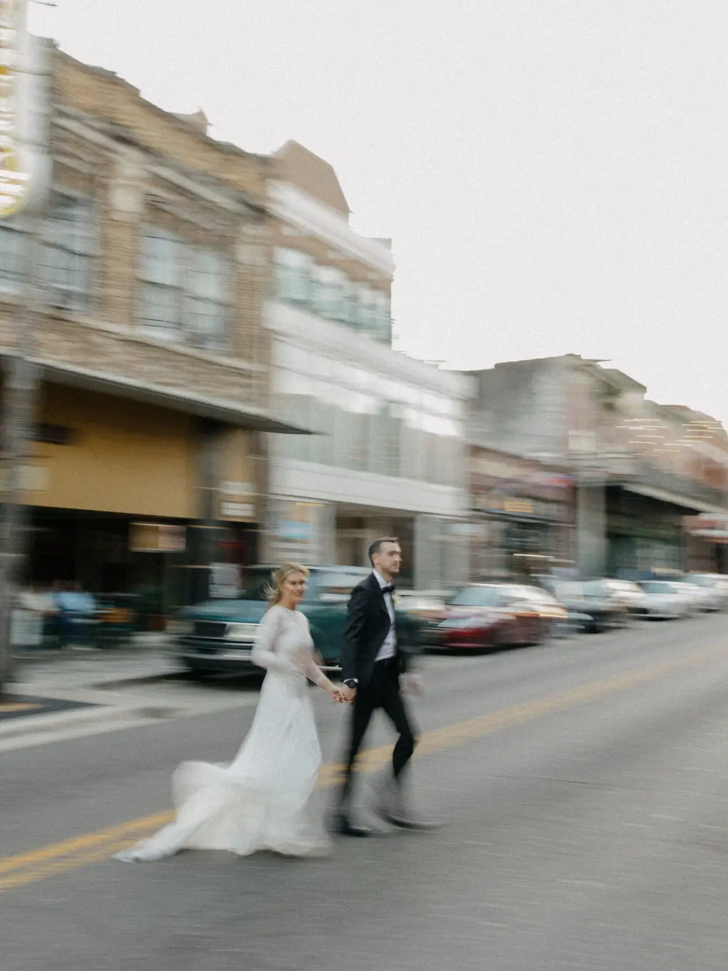 Bride and Groom Walking the Streets of Ybor Wedding Portrait