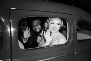 Vintage Old Hollywood Gatsby Inspired Brooke and Groom Wedding Exit with Classic Car| Tampa Bay Wedding Venue The Whitehurst Gallery