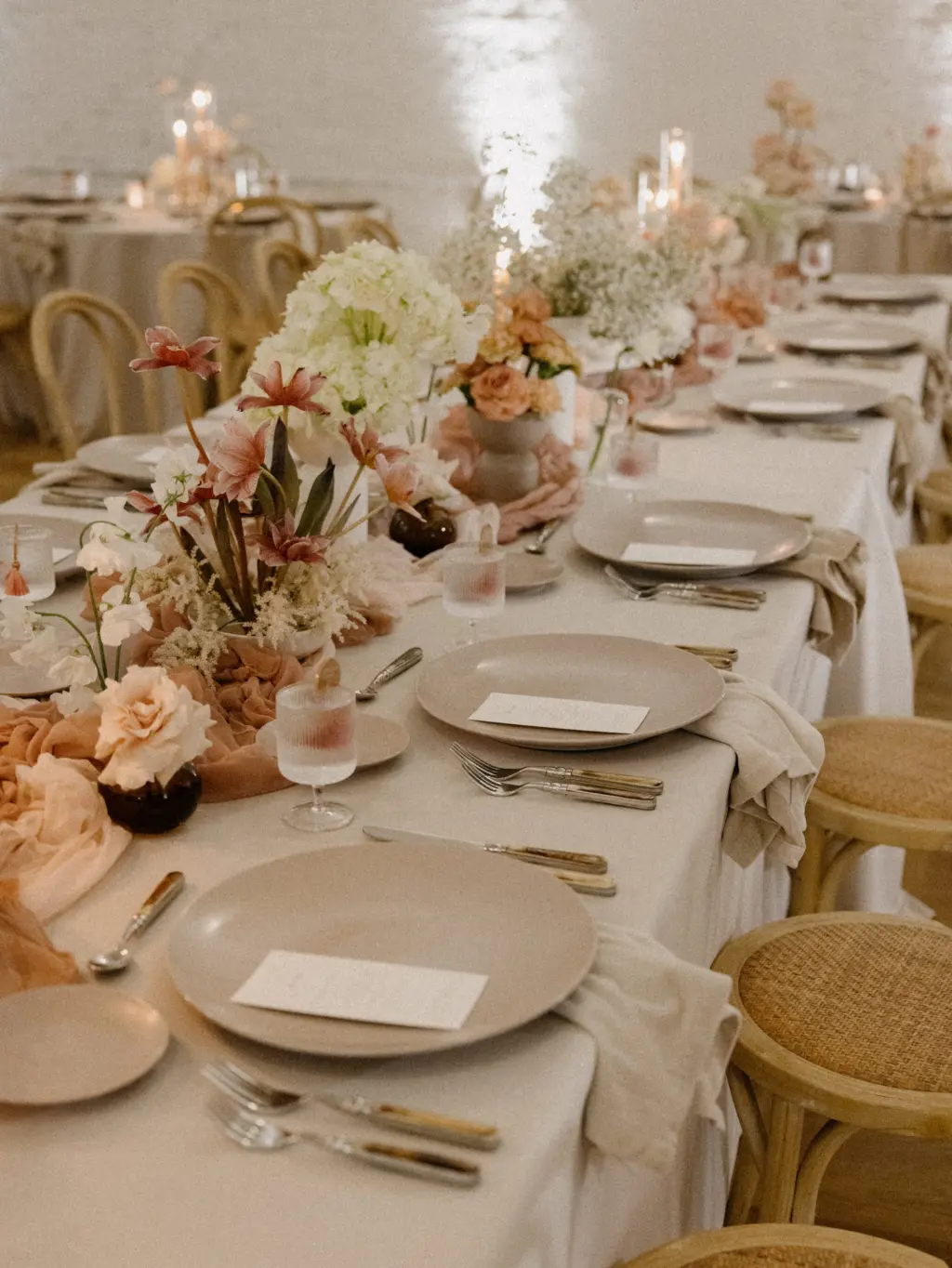 Romantic Boho Beige and Cream Wedding Reception with Pink and White Floral Centerpieces | Neutral Table Setting Ideas