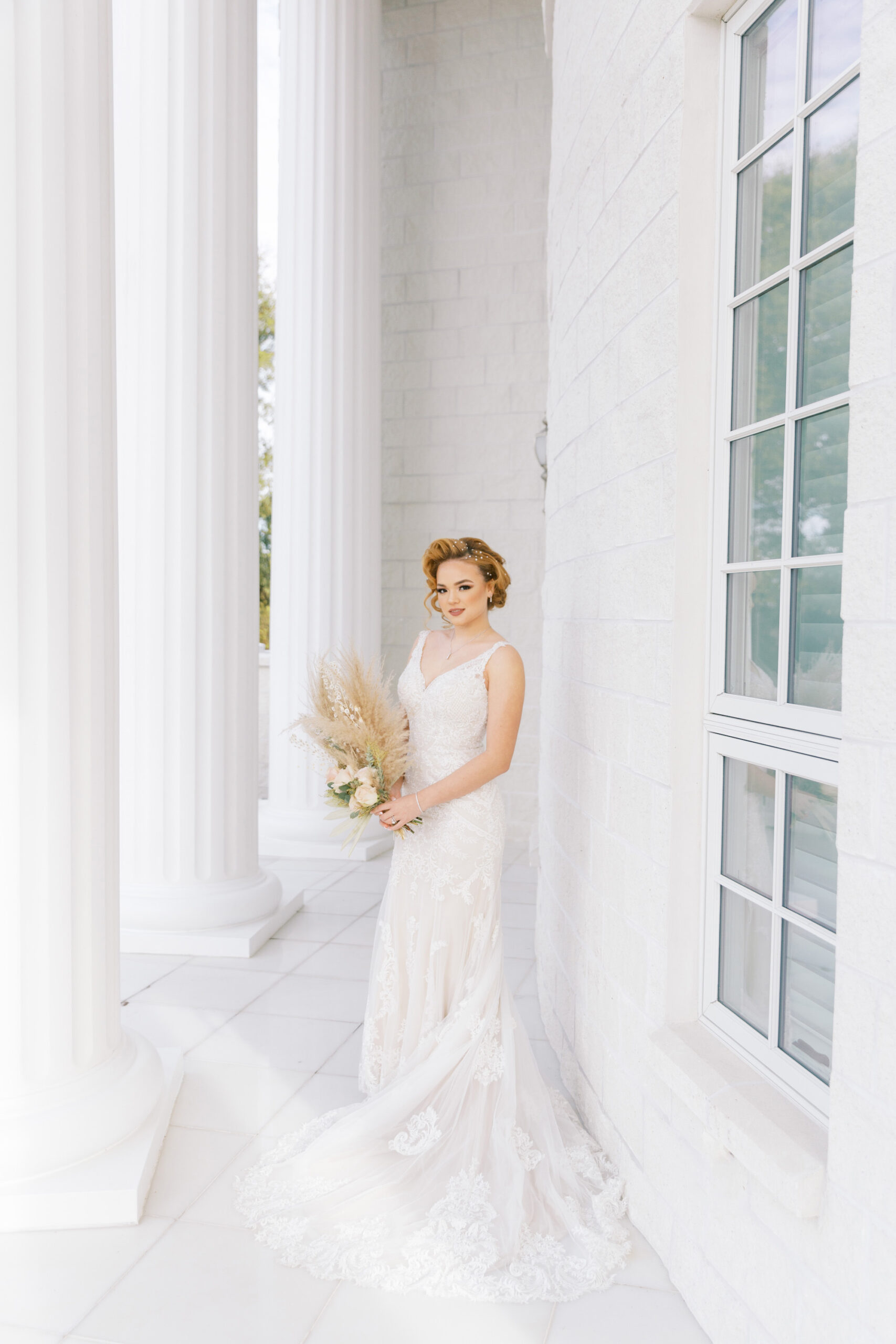 Vintage 1920s Old Hollywood Gatsby Inspired Bride Holding Boho Floral Bouquet with Pampas Grass | Tampa Bay Wedding Venue The Whitehurst Gallery | Hair and Makeup Artist Femme Akoi Beauty Studio
