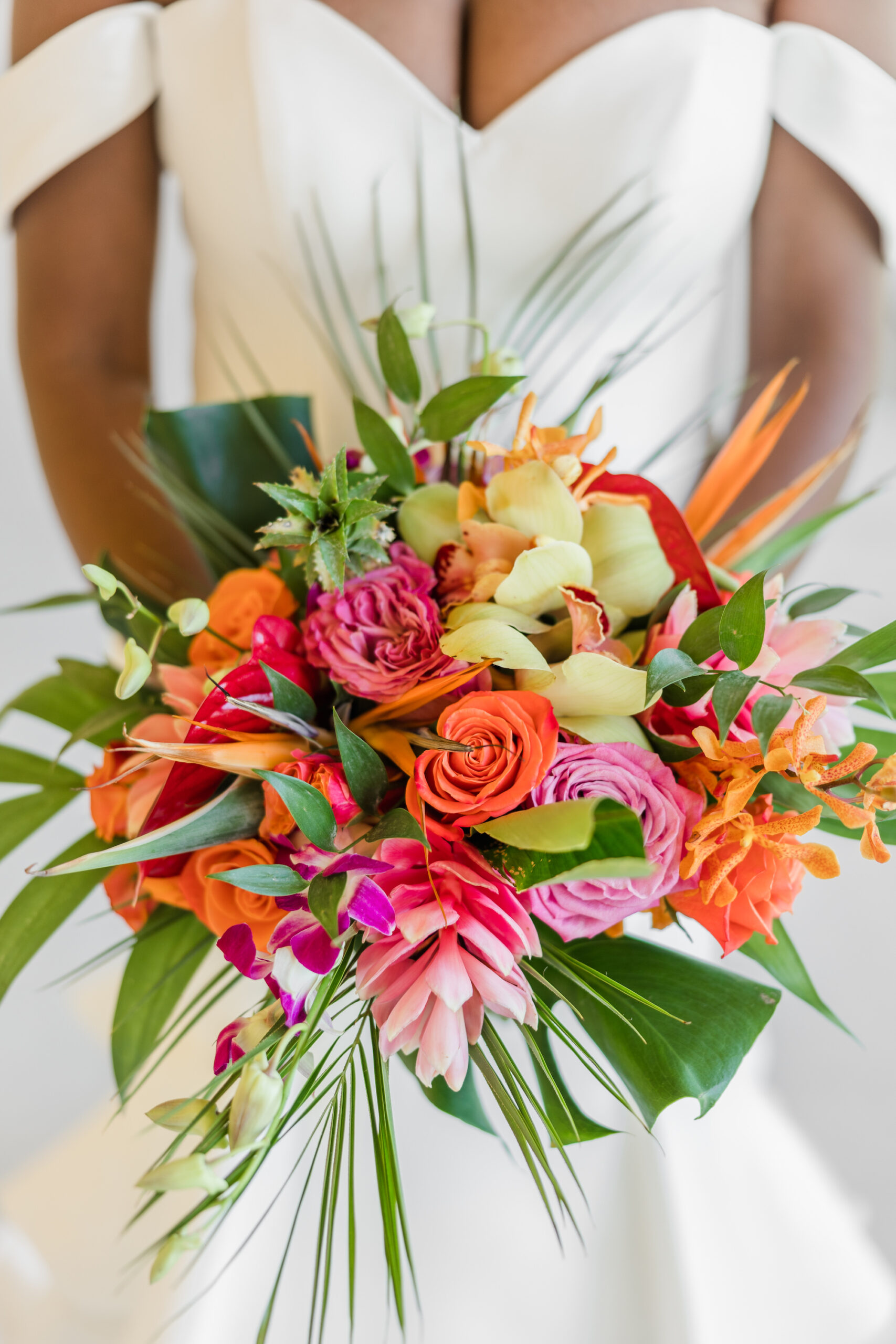 Lush Orange, Purple, Pink, and Yellow Flowers with Tropical Greenery Bridal Wedding Bouquet Inspiration | Tampa Bay Florist Save the Date Florida