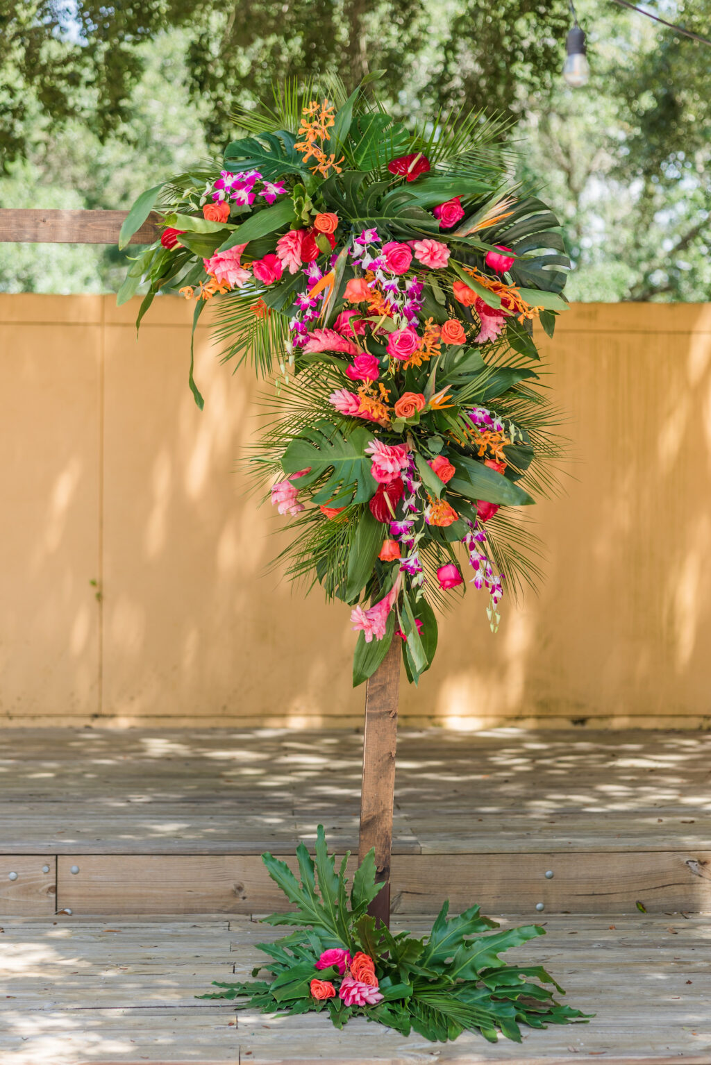 Pink and Red Tropical Wedding Ceremony Arch Inspiration | Tampa Bay Wedding Florist Save the Date Florida