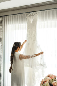 White Deep V Neckline Lace Fit and Flare Olia Zavozina Wedding Dress | Bride Getting Ready Wedding Portrait | Tampa Bay Photographer J&S Media