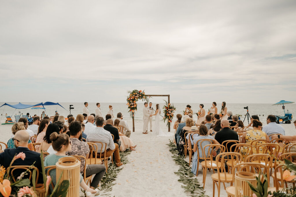 Tropical Beach Florida Wedding Ceremony Inspiration | Tampa Bay Florist Save the Date Florida | Planner Wilder Mind Events