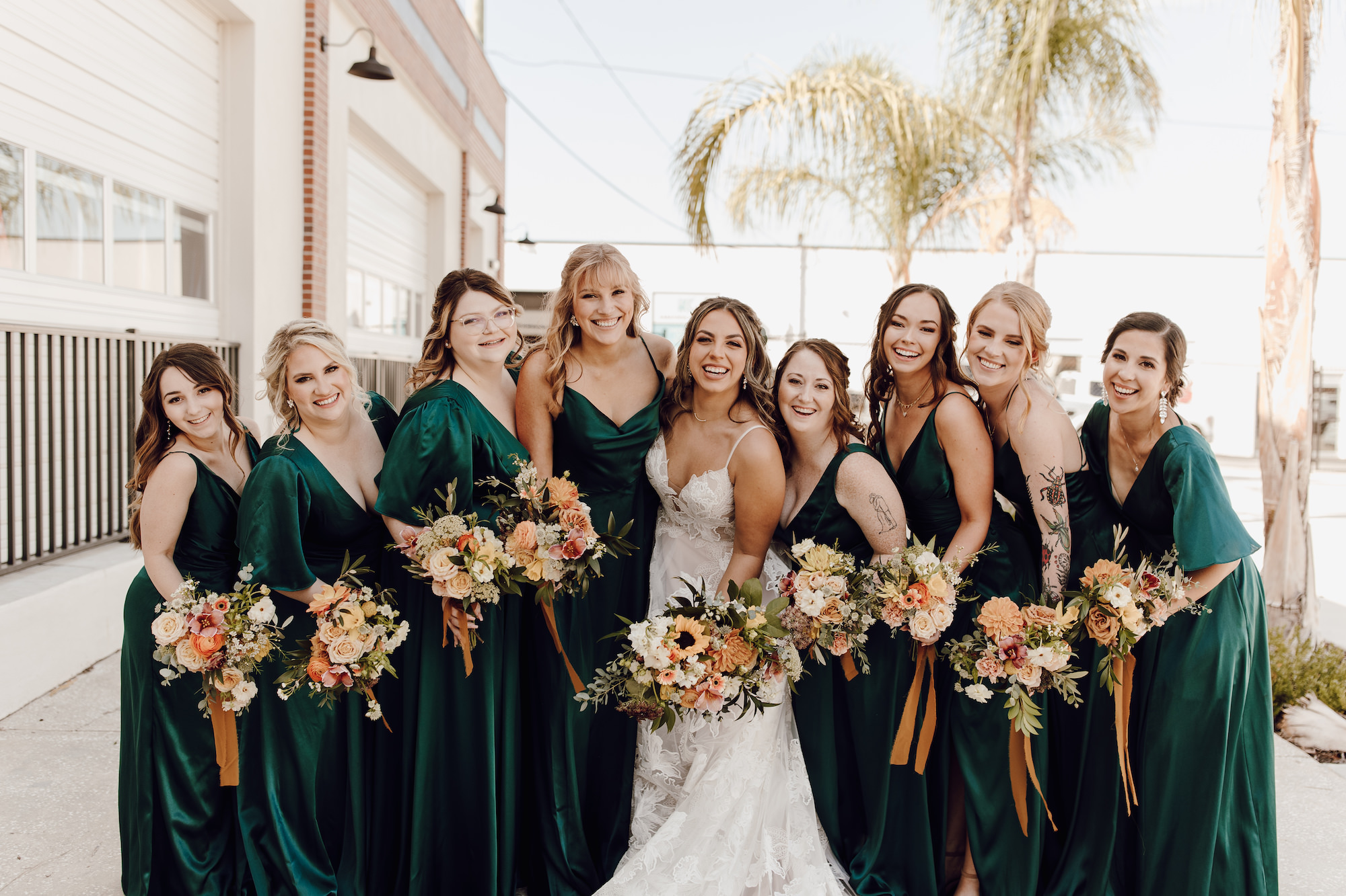 Boho Orange, White, Peach, Flowers, with Greenery and Ribbon Bouquet Inspiration | Emerald Green Jewel Toned Mismatched Bridesmaids Dress Ideas