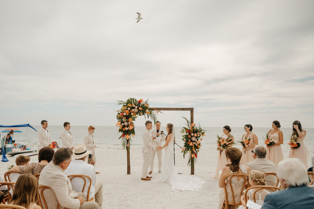Tropical Beach Florida Wedding Ceremony Inspiration | Tampa Bay Florist Save the Date Florida | Planner Wilder Mind Events