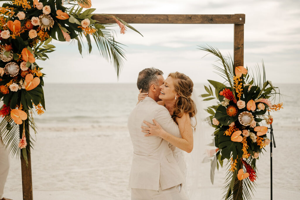 Bride and Groom First Kiss Wedding Portrait | Bradenton Florist Save the Date Florida
