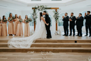 Bride and Groom First Kiss Wedding Portrait