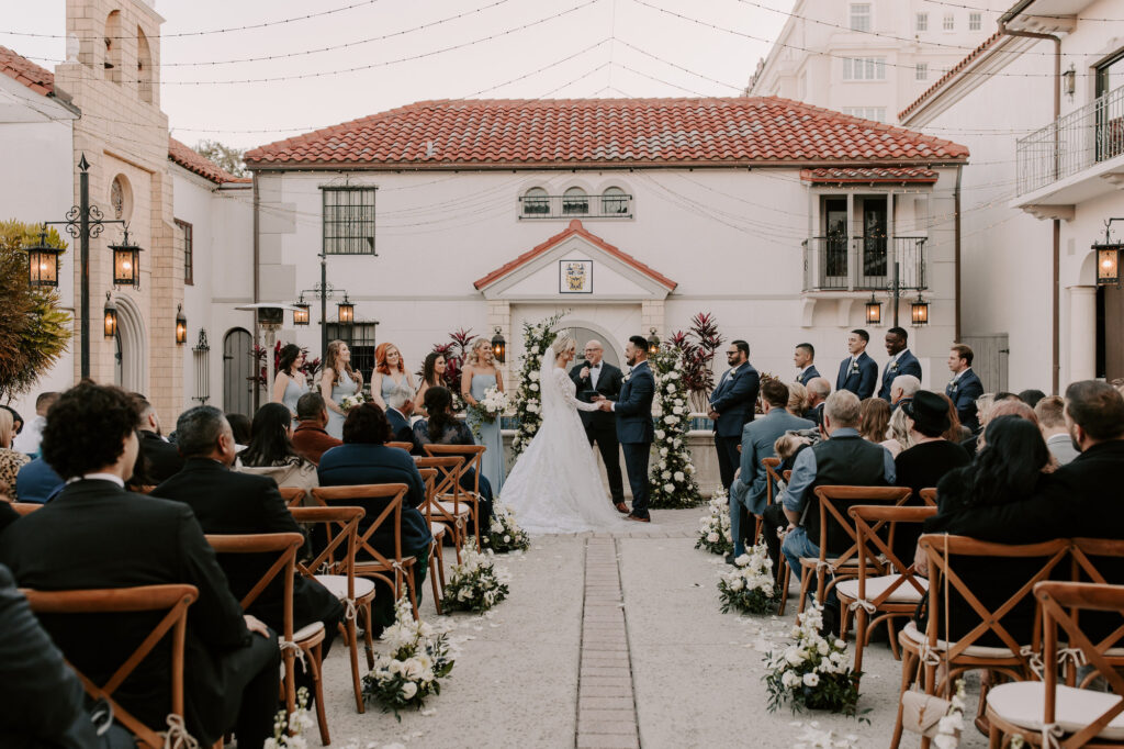 Romantic Spanish Inspired Outdoor Courtyard Venue | Dusty Blue Wedding Ideas | Sarasota Planner Coastal Coordinating | Venue The Bishop Museum
