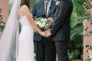 Bride and Groom Exchange Vows in Romantic Timeless Garden Wedding Ceremony