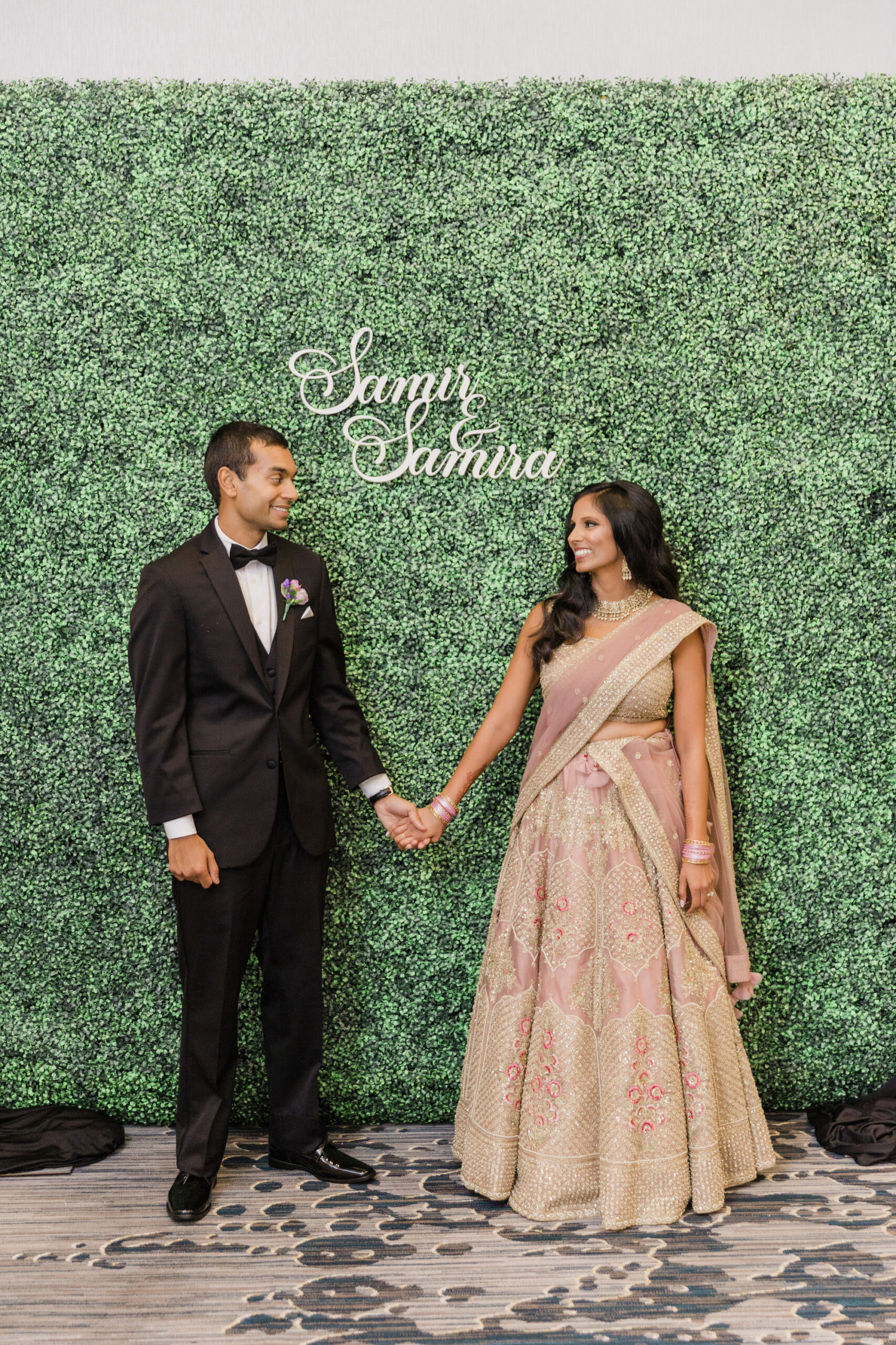 Green Grass Wall Backdrop Indian Wedding Reception Photo Op Inspiration | Tampa Bay Coordinator Coastal Coordinating