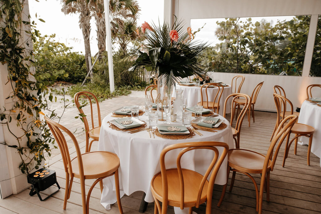 Boho Rattan Outdoor Wedding Reception Centerpiece Table Decor Inspiration | Laser Cut Monstera Guest Place Card | Sarasota Florist Save the Date Florida