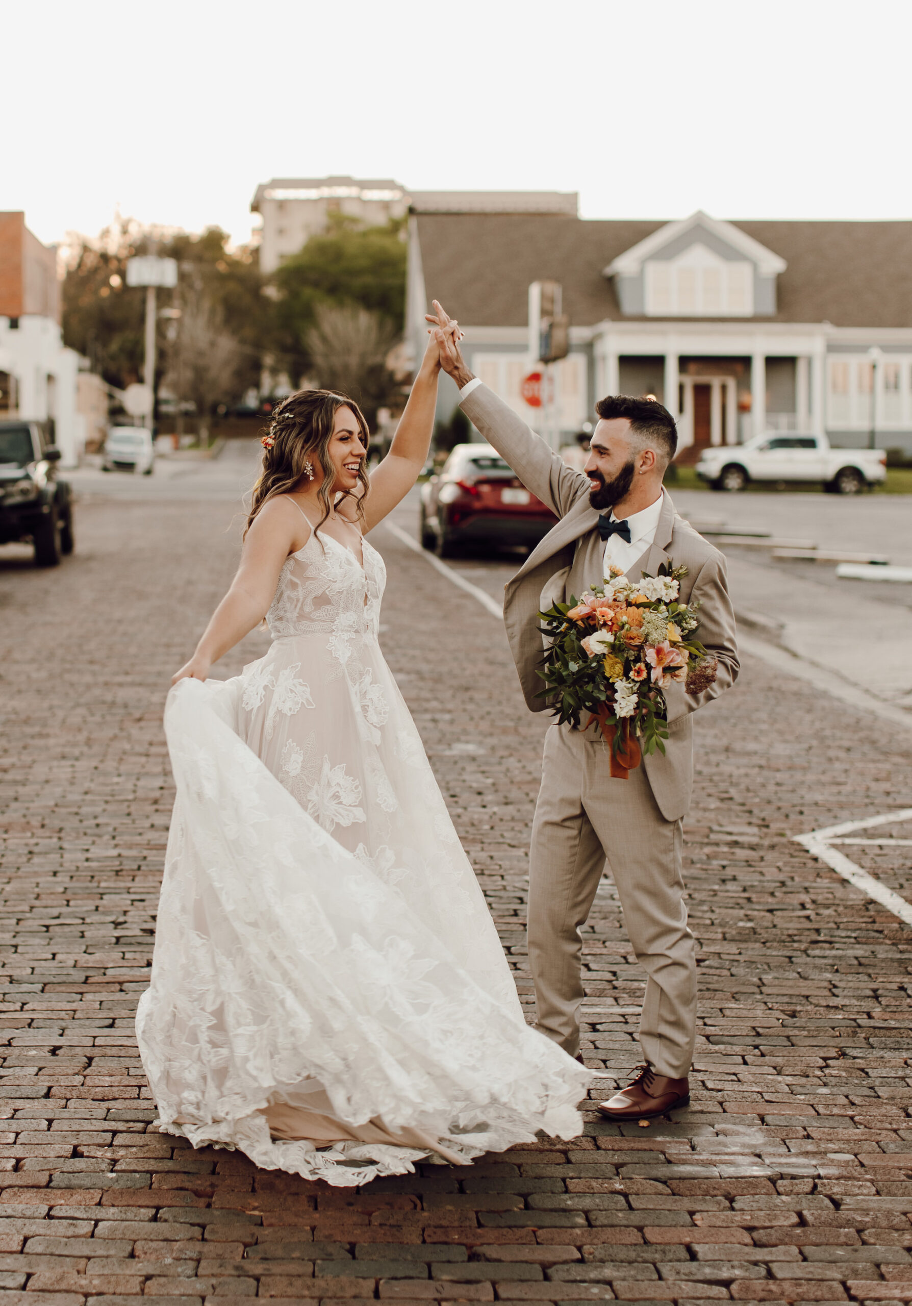 Bride and Groom Dancing in the Street Wedding Portrait | Dade City Venue at the Block