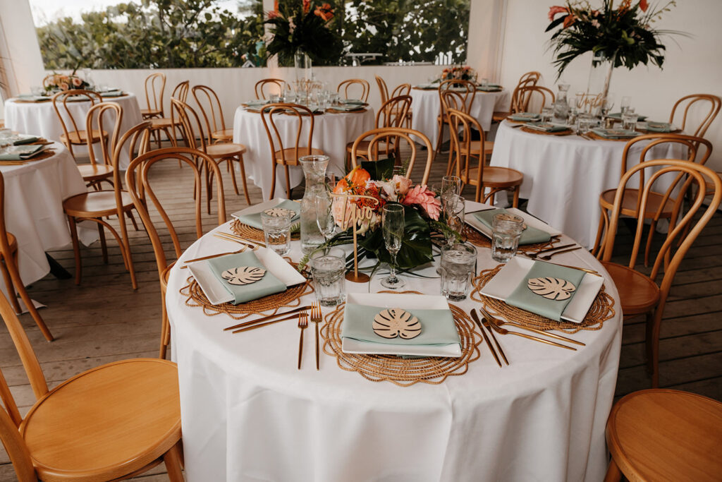 Boho Rattan Wedding Reception Table Decor Inspiration | Laser Cut Monstera Guest Place Card | Bradenton Planner Wilder Mind Events | Florist Save the Date Florida