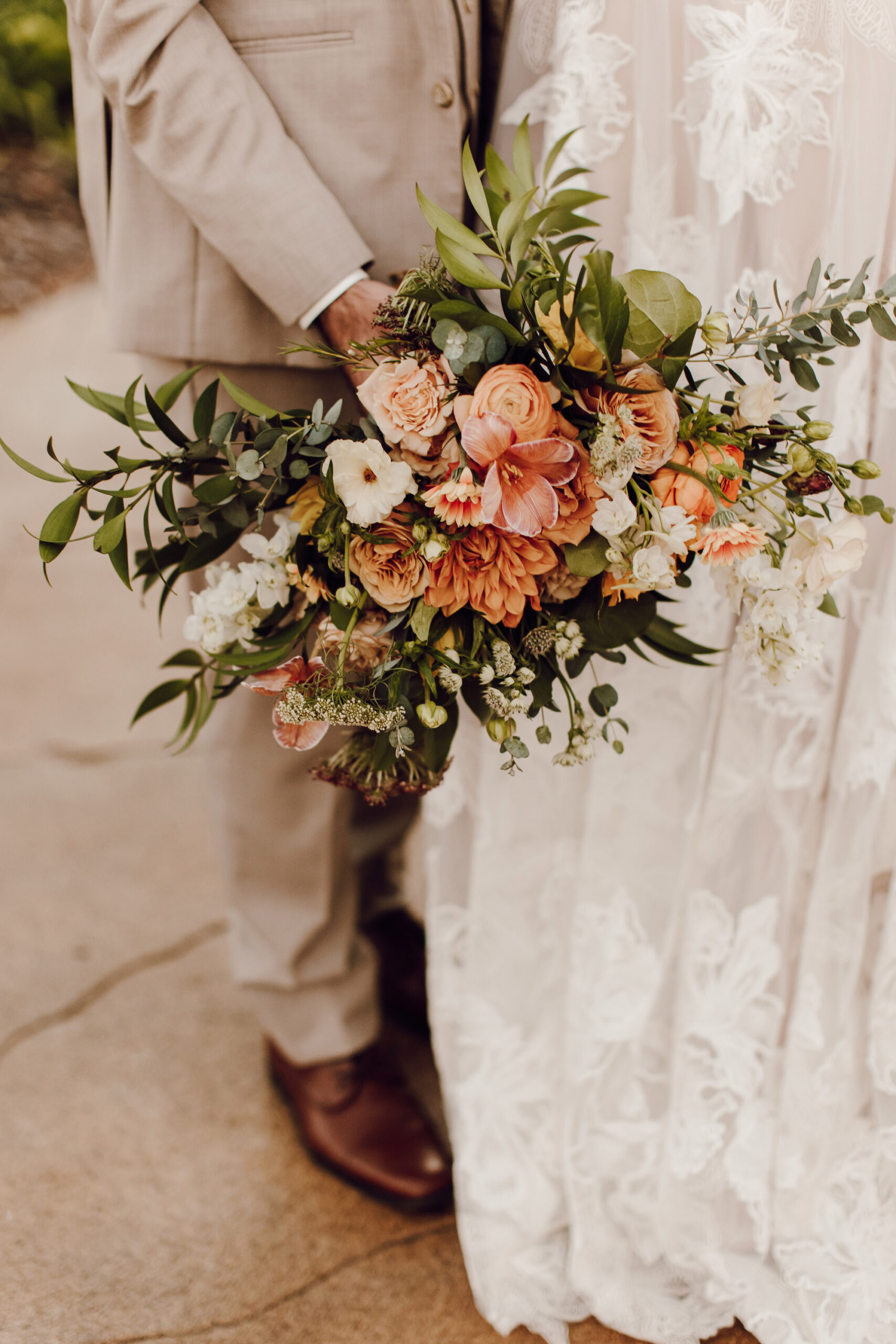 Orange, Peach, and White Flowers with Ruscus Greenery Bridal Wedding Bouquet Wedding Ideas
