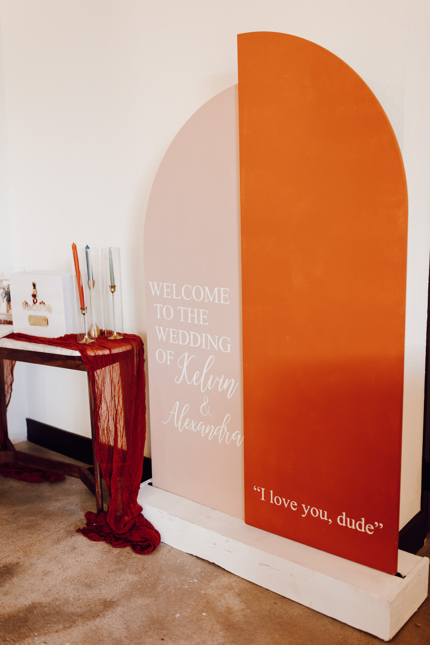 Unique Modern Boho Half Arch Orange and Blush Wedding Reception Welcome Sign