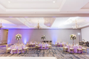 Elegant Purple and Gold Indian Wedding Reception Inspiration | Tall Flower Stand Centerpieces | Downtown Tampa Hotel Ballroom Tampa Marriott Waterside | Rentals Gabro Event Services | Planner Coastal Coordinating