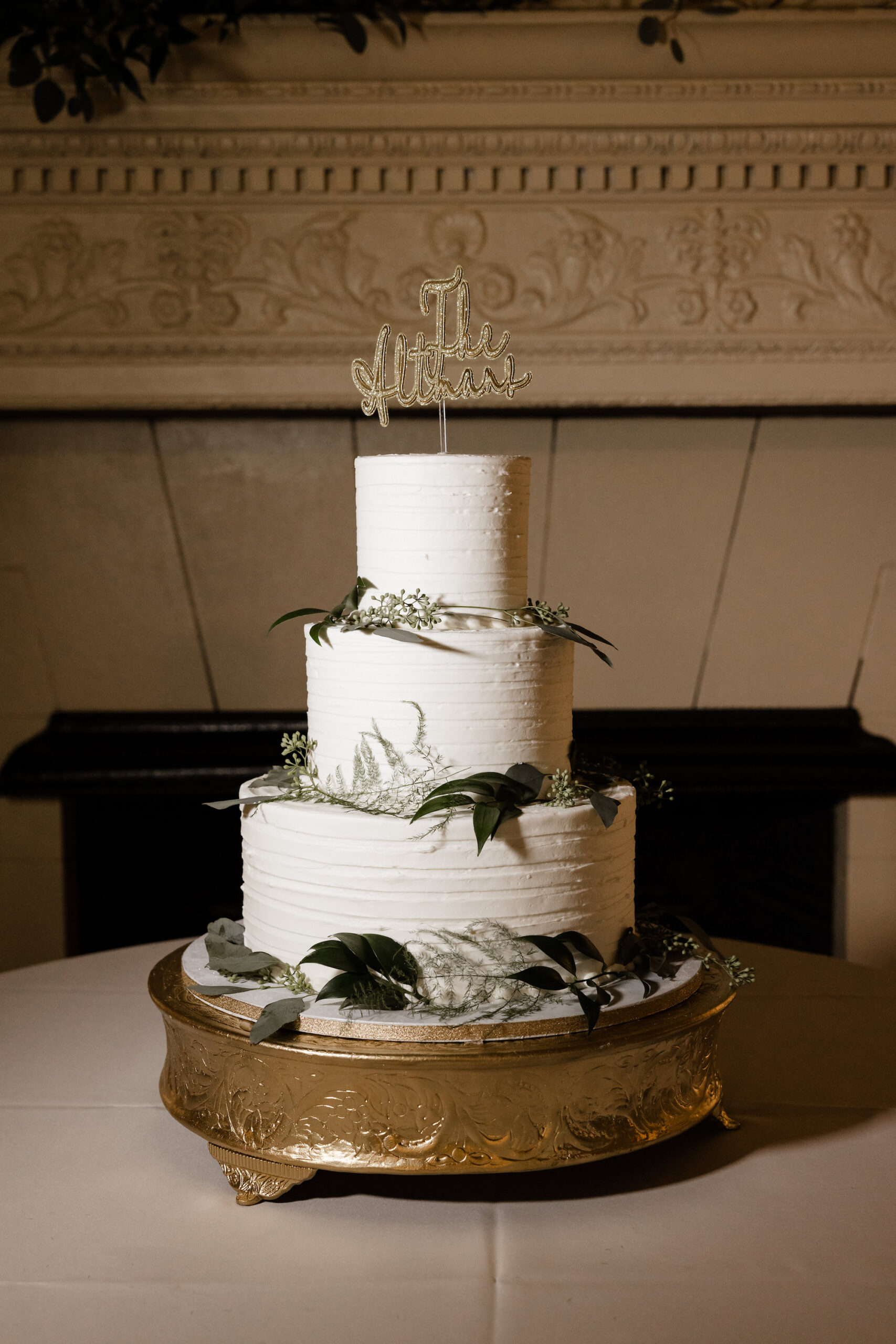 Three-tiered Round Buttercream Wedding Cake with Real Greenery | Custom Cake Topper