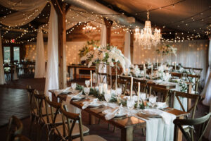 Romantic White Indoor Wedding Reception Decor Ideas | Market Lights and Chandelier Lighting | The Carriage Stable House | Tampa Bay Venue Cross Creek Ranch