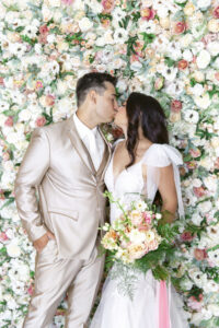 Wedding Reception Flower Wall Backdrop Ideas for Photobooth with Greenery, Peach, Pink, and White Flowers