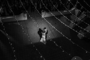 Bride and Groom Outdoor First Dance with Twinkle Market Lights | Sarasota Wedding Photographer Garry and Stacy Photography Co
