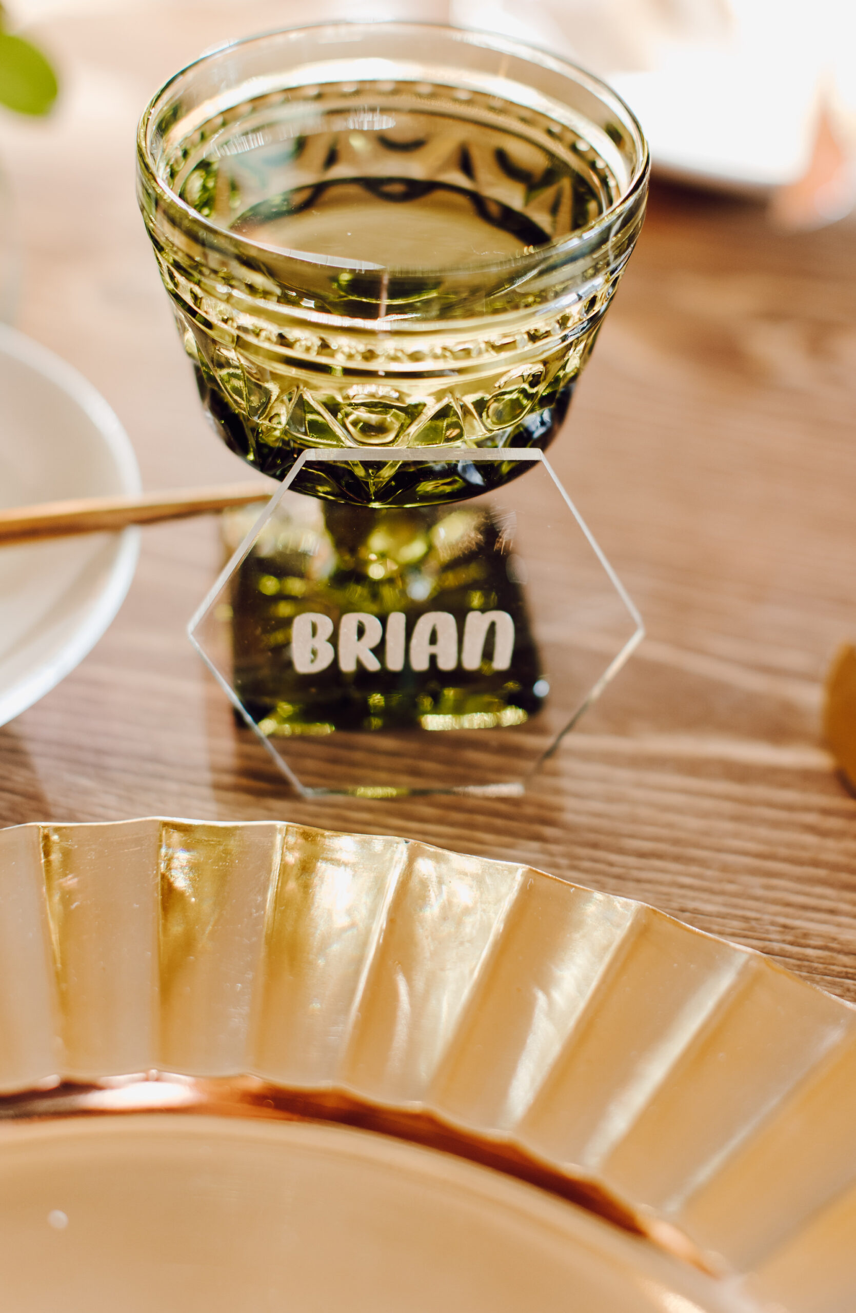 Acrylic Name Place Cards | Gold Fluted Charger Plate with Green Glass Goblet Wedding Reception Table Setting Inspiration