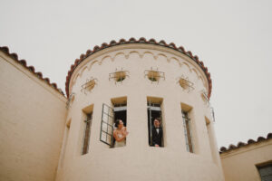 Bride and Groom Window Wedding Portrait | Sarasota Wedding Venue Powel Crosley Estate | Photographer and Videographer Mars and the Moon Films