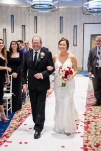 Bride and Father Walking Down Aisle Wedding Portrait | Red Rose Petals on Aisle