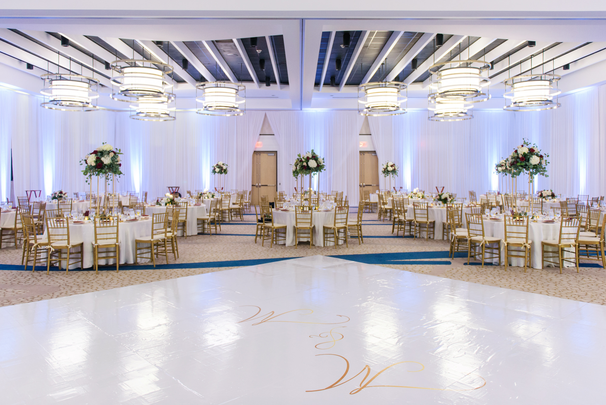 Modern All White Wedding Reception Ideas | Customized Monogram Dance Floor Wrap | Rentals Gabro Event Services | Venue Wyndham Grand Clearwater Beach Wedding