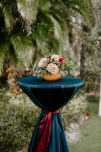 Jewel Toned Wedding Floral Centerpiece on Blue Linen Cocktail Table at Wedding Cocktail Hour | Sarasota Wedding Florist Beneva Flowers