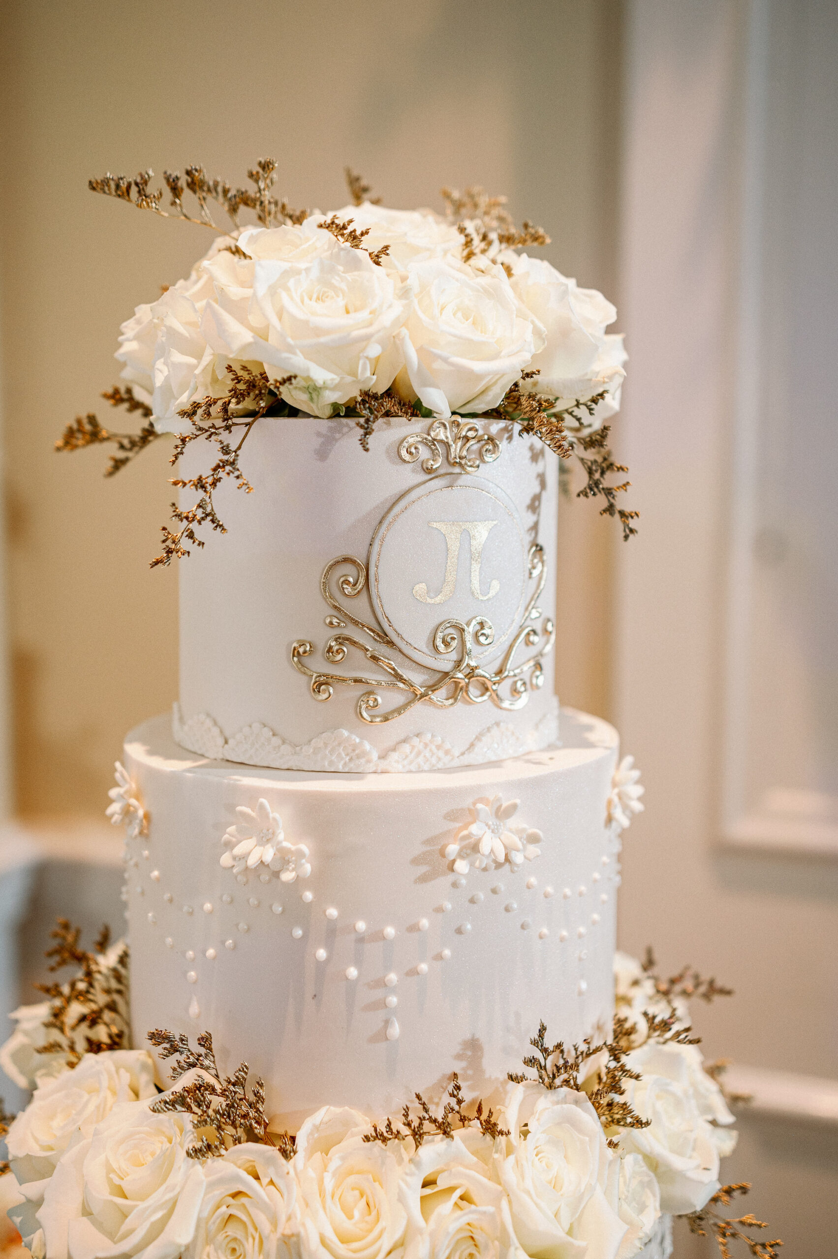 White Two-Tiered Custom Logo Wedding Cake with Real Roses | Tampa Bay Bakery The Artistic Whisk