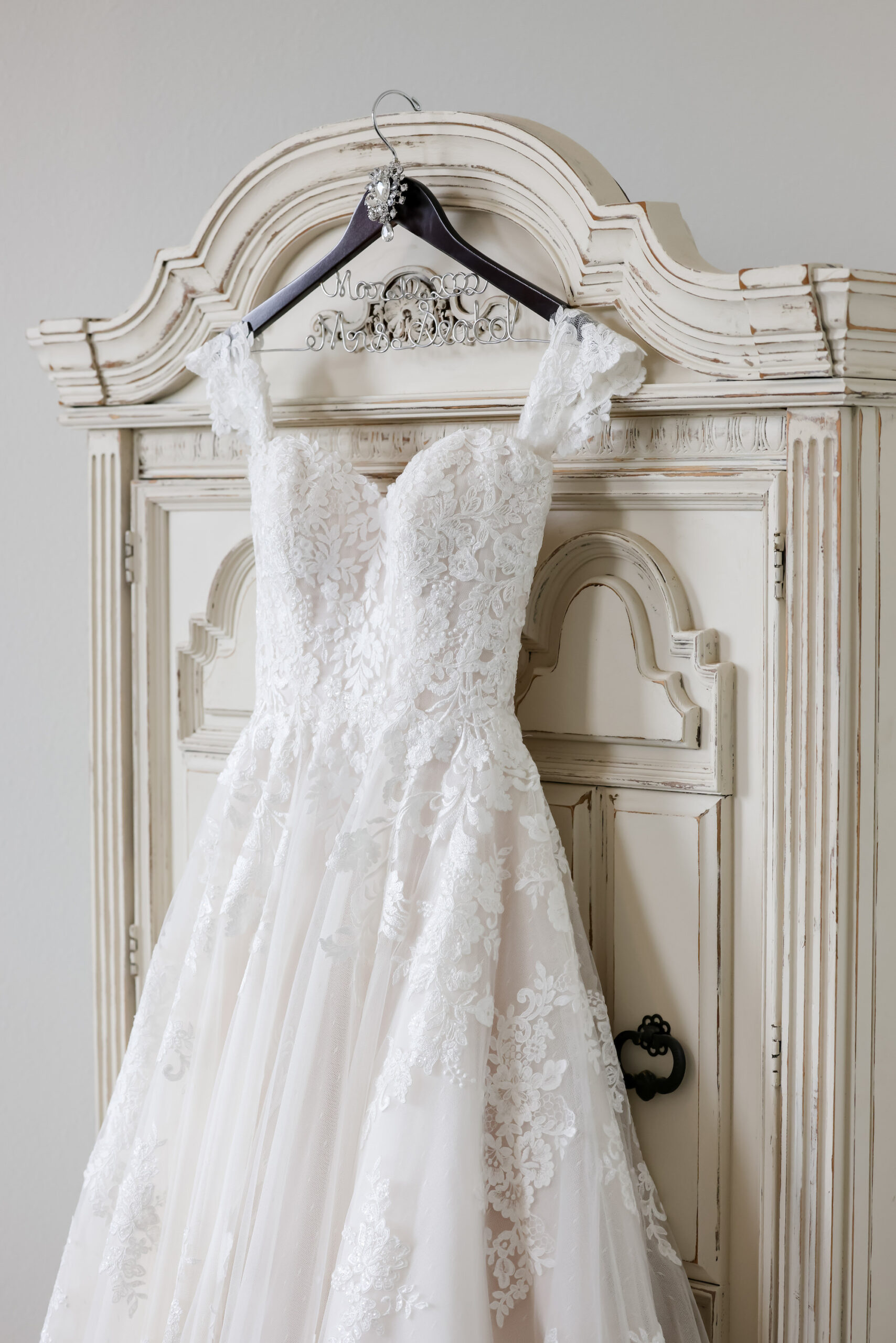 White Ivory Off The Shoulder Lace A Line Justin Alexander Wedding Dress | Tampa Bridal Shop Truly Forever Bridal