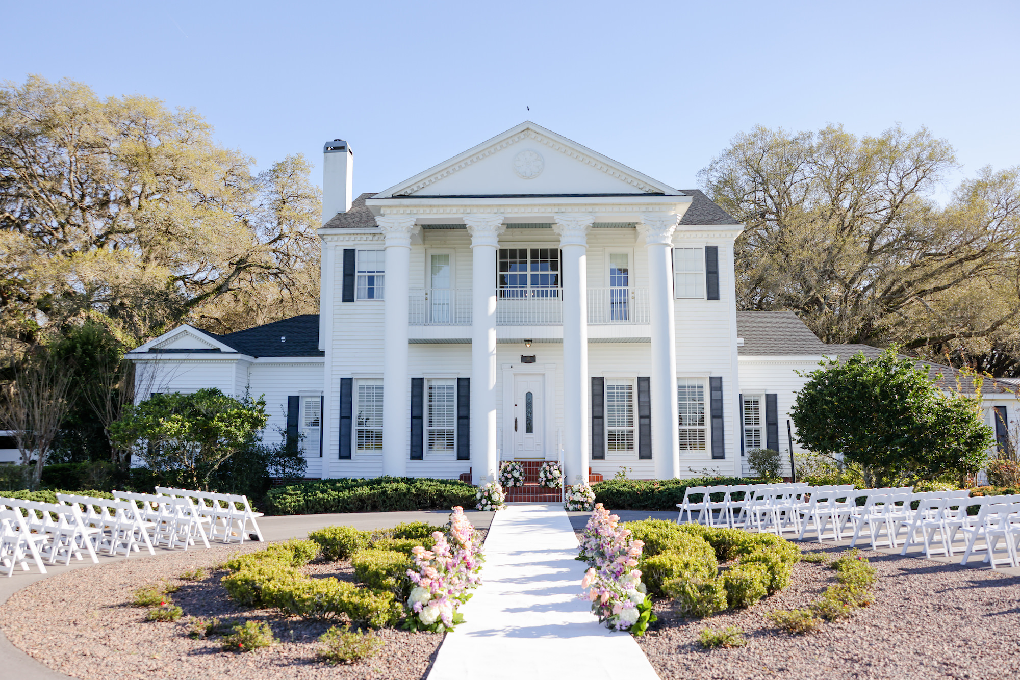 Southern Venue Private Wedding Estate Ceremony Inspiration | Brooksville Wedding Venue Legacy Lane Weddings | Garden Folding Chairs